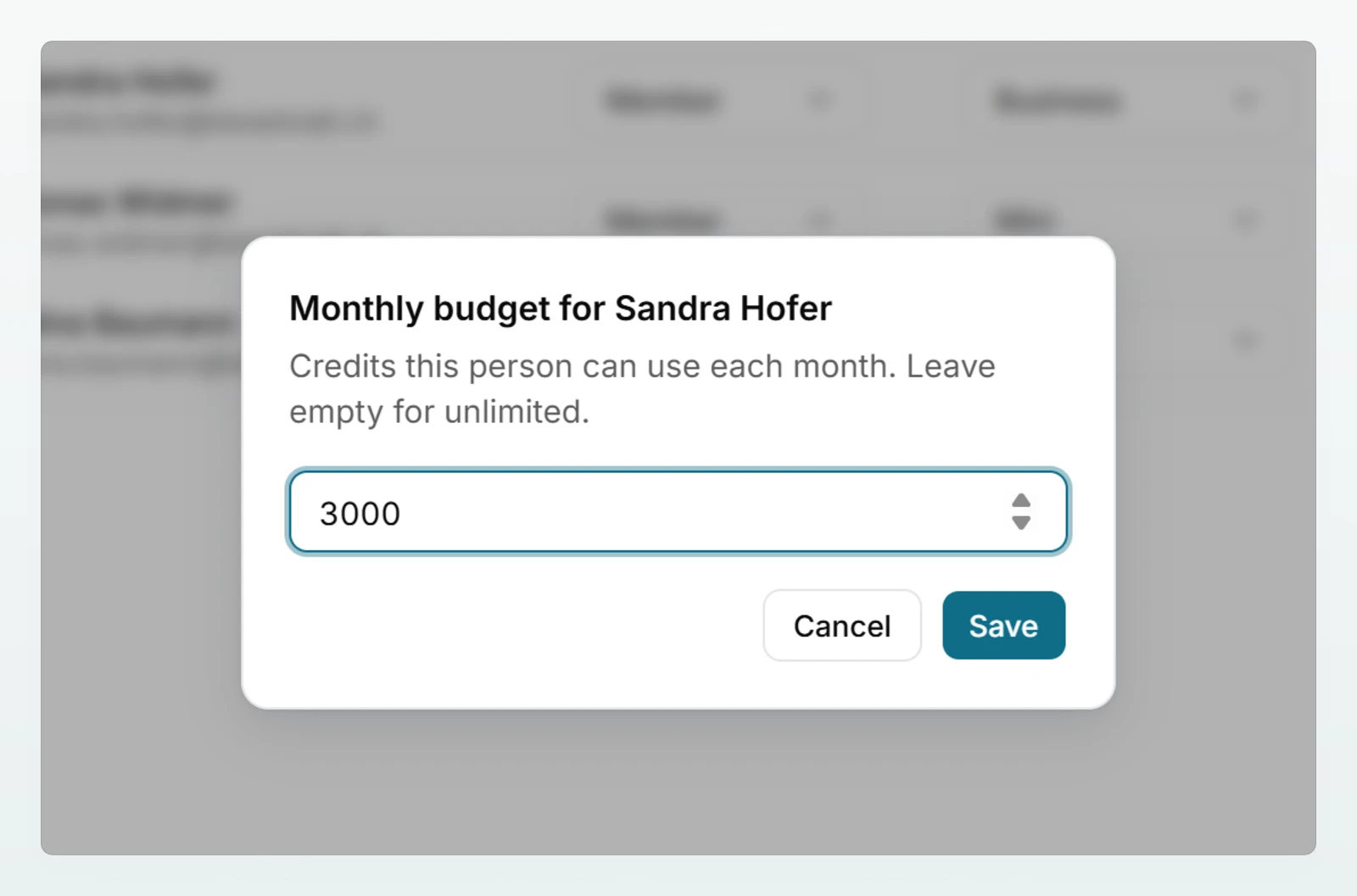 The monthly budget dialog for a member with 3000 credits entered and the hint to leave the field empty for unlimited.
