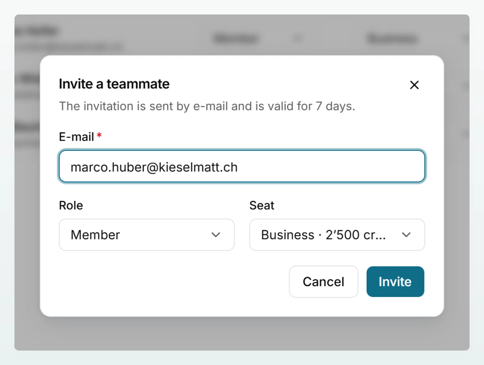The “Invite a teammate” dialog with an email address filled in, the role “Member” and the seat choice.